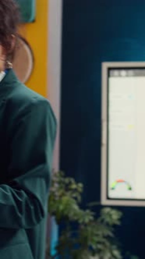 Corporate Workers Looking Into Project Updates and Timelines in Boardroom