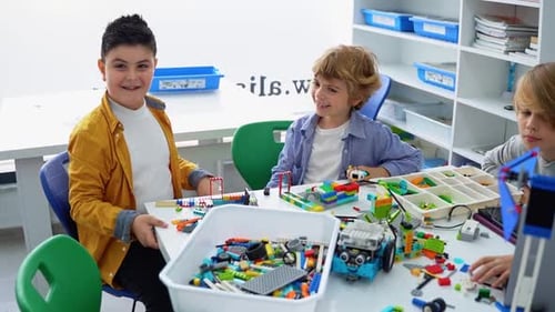 Robotics Programming Class Children Construct and Code Robot STEM Education Using Constructor
