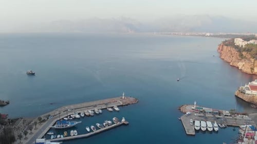 A Beautiful Shot of a Sea Bay with Boats for a Travel Video