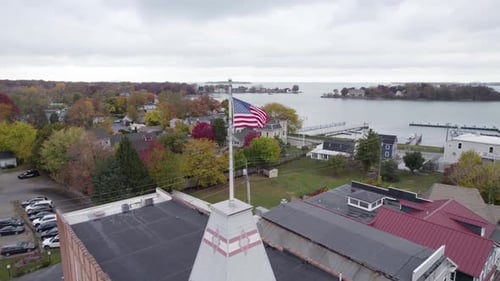 Aerial shot of American flag in small town
