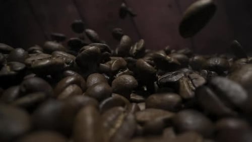 Coffee Beans Falling with Smoke, Close Up Shot