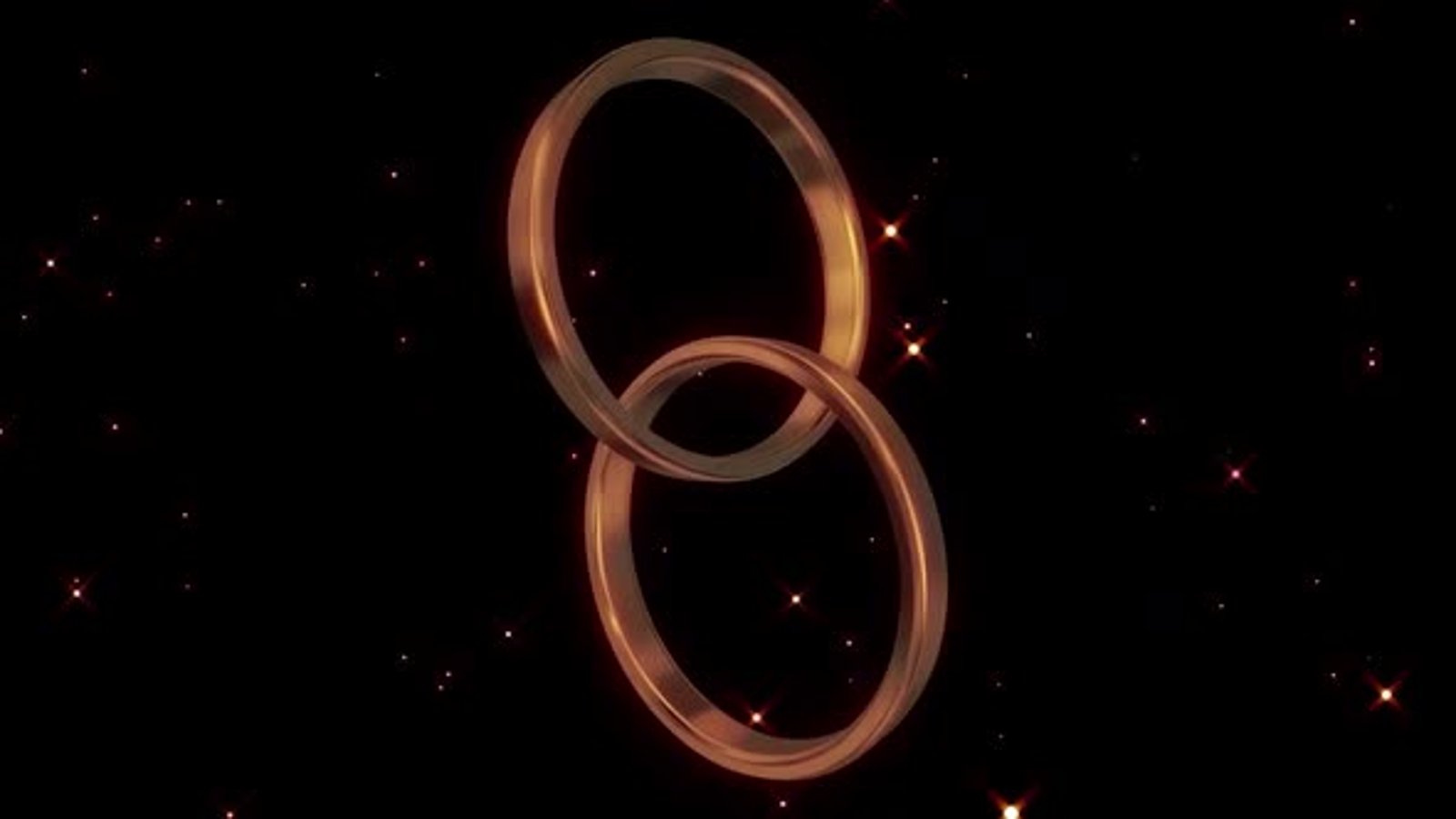 Interlocking Golden Wedding Rings Animation with Sparkles, Motion ...