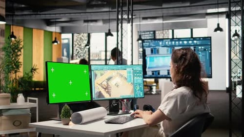 Real Estate Developer Reviews Project Blueprints with Chroma Key