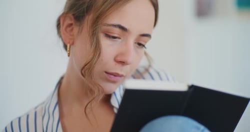 Woman Writing In Notebook Learning