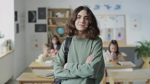Self-confident Teen Boy In Classroom