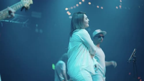 Band Playing Music and Singing on Stage