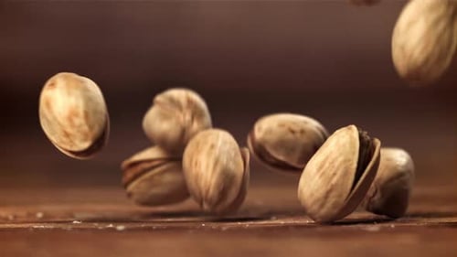 The Pistachios Fall on the Table Filmed on a Highspeed Camera at 1000 Fps