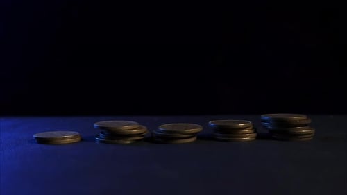 Growing Stack of Coins Shows Financial Increase