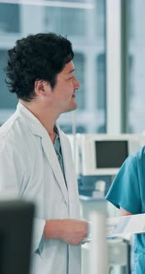 Doctor Discussing Medical Information in a Modern Hospital