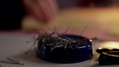 Magnetic Pin Holder with Assorted Sewing Pins in Tailoring Workshop