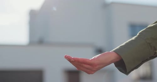 Woman Holding Keys to New House Moving to a New Home Mortgage Buying Real Estate Renting and Booking