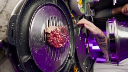 vertical video close-up of delicious appetizing juicy piece of raw meat being grilled in restaurant