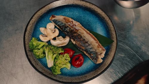 Fresh Seafood Dish being Plated in Restaurant Kitchen