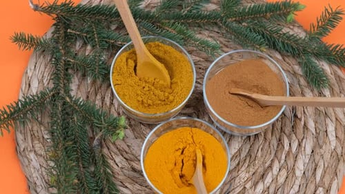 Three Bowls of Spices with Evergreen Sprig