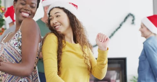 Friends Celebrate Christmas with Dancing and Cheer