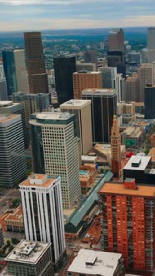 Contemporary downtown of Denver, Colorado, USA at cloudy daytime.