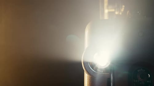 Warm Glow of Projector Beam Light Nostalgic Charm of Classic Cinema Retro Filmmaking Aged Film
