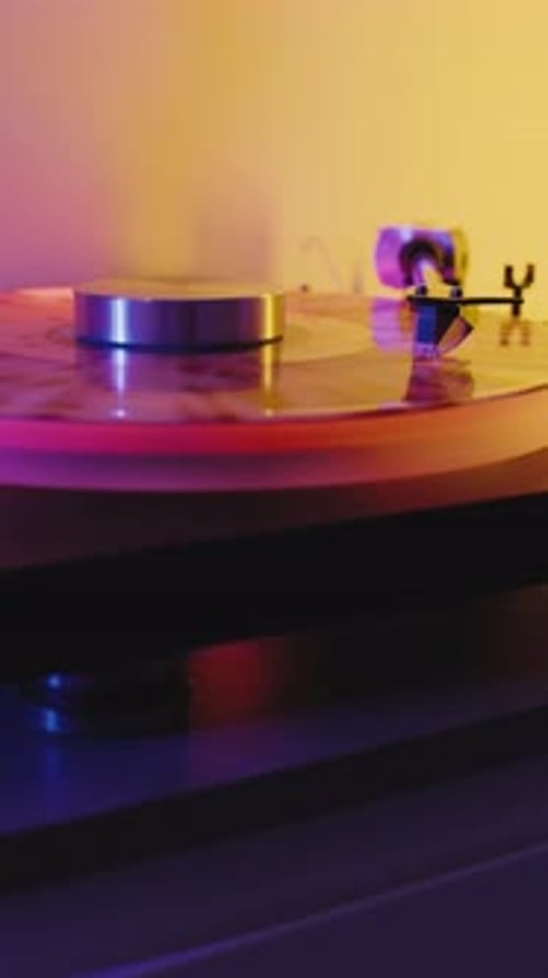 Discover a Stylish Vintage Turntable with Vibrant Lighting Blending Art and Mechanics for an