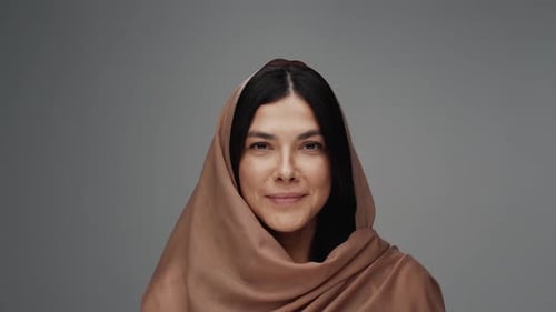 Smiling Woman Wearing a Head Covering Close Up