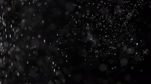 Abstract Shot of Bokeh Particles on Black