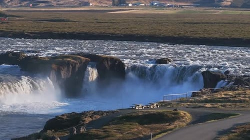 Aerial View of the Powerful Godafoss Waterfall on a Sunny Day in Northern Iceland