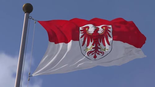 Realistic Brandenburg Flag Waving Against Blue Sky