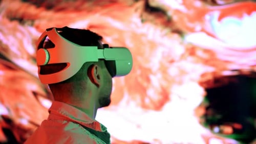 Man Interacts With Virtual Reality Headset