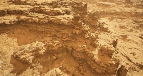 Stunning Rock Formations in a Remote Desert Landscape Under Bright Sunlight