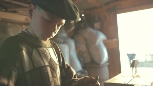 Boy Teenager in an Old Workshop