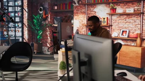 Upset Programmer Annoyed By Computer Bugs While Coding in IT Startup Office