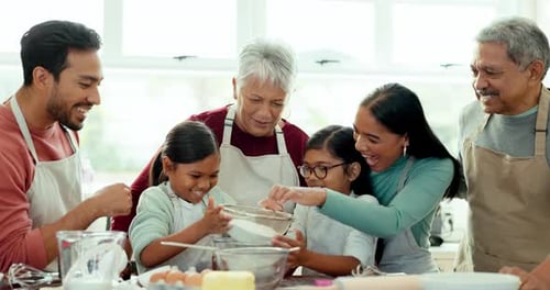 Multi-generational Family Baking Together at Home