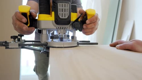 Wood Router in Action Smoothly Cutting Into a Wooden Surface Shot Highlights Woodworking