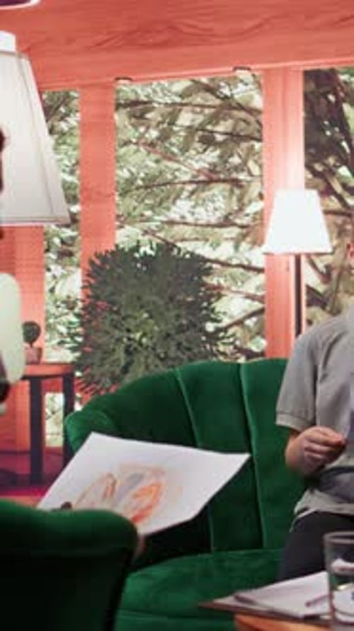 Child Patient Sharing Drawings in Therapy Session