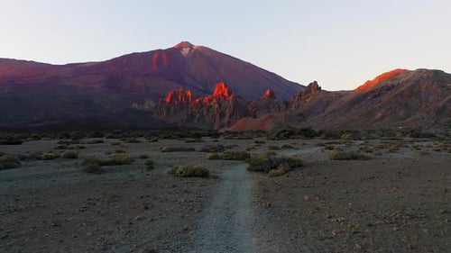 Aerial View of a Beautiful Sunset Over Scenic Mountain Valley