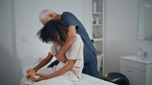 Chiropractor Examine Woman Problem in Clinic Ward Therapist Doing Recovery