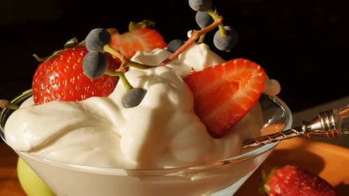 Fresh Berries with Whipped Cream Dessert in Bowl