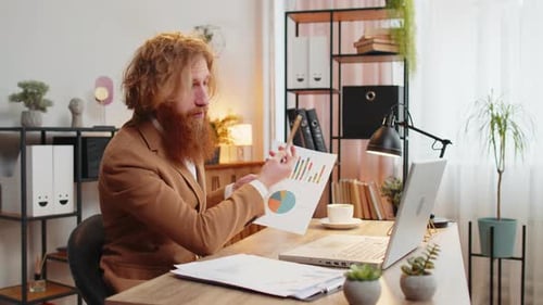 Businessman Working on Laptop at Home Office Desk Talks on Online Communication Webcam Video Call