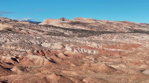 Breathtaking Drone Footage of Arid Canyon Walls and Layered Desert Landscape