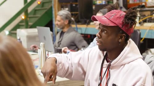 Computer Programmer Talking During Hackathon 2529 Years