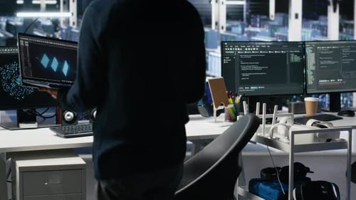 Data Center Technician Entering Office Managing AI Systems