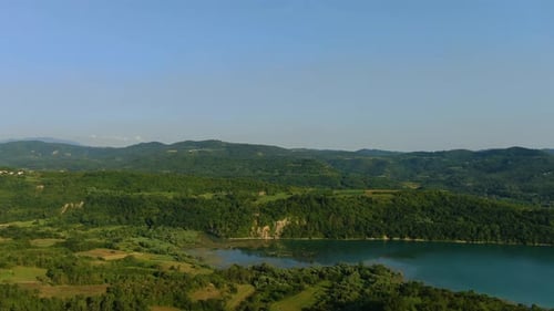 Lake Butoniga dam water reservoir in Croatia Istria peninsula, Aerial drone approach shot
