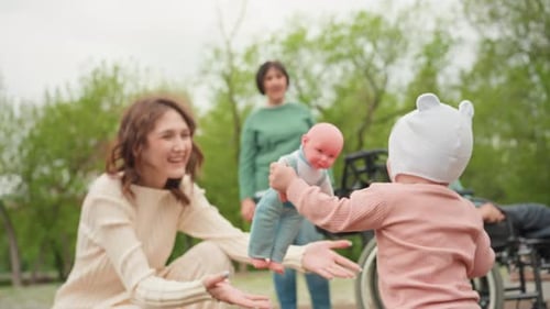 Happy baby with family in outdoor urban setting