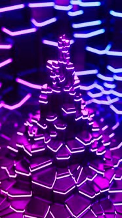 Una torre futurista de hexágonos de neón. Animación en bucle vertical