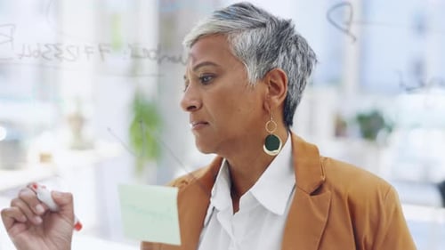 Woman writing notes for business, brainstorming and research target agenda at office window
