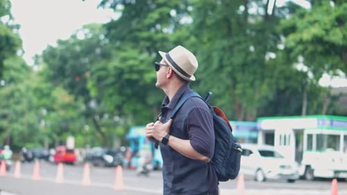 Asian Tourist Man Enjoying Sightseeing In The City