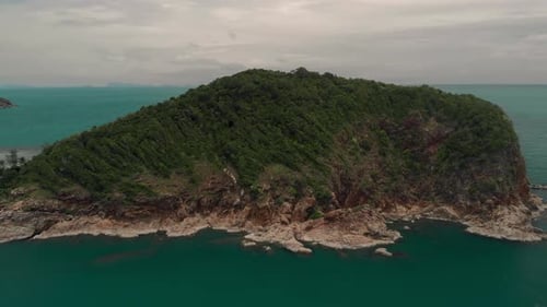 Aerial panorama of small tropical island in sea Thailand Ko Ma Koh Phangan