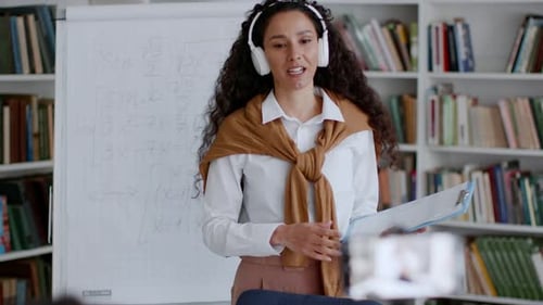 Energetic Woman Teaching Online Math Class