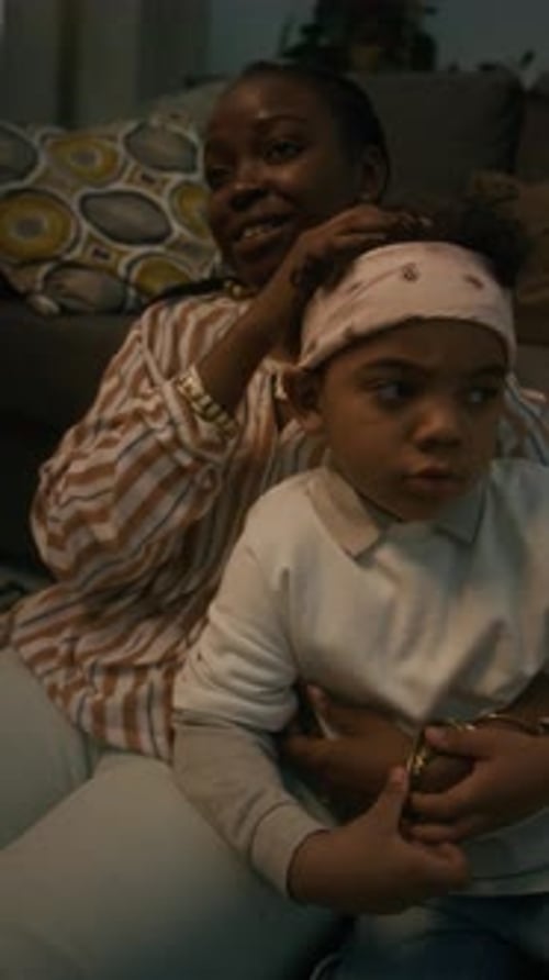 Affectionate Mother and Child Embrace Indoors