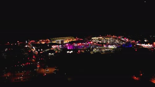 Aerial View Over Belmont Park Illuminated At Night In San Diego, California - Drone Shot