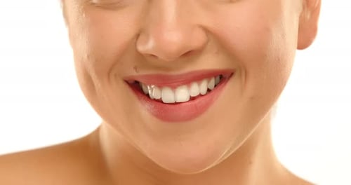 Woman Smiling Close Up on White Background